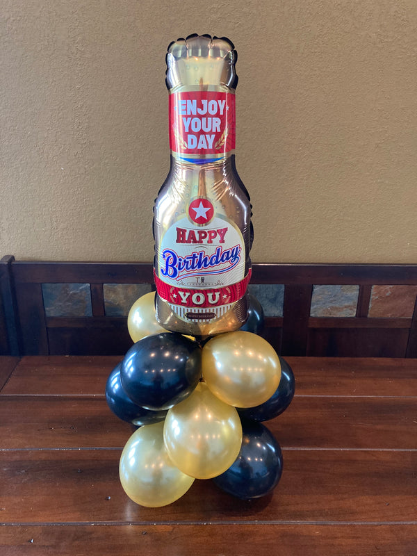 Celebrating your birthday. Cheers to you. Balloon centerpiece.